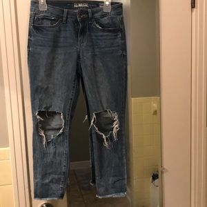 Medium wash, mid rise high cut jeans
